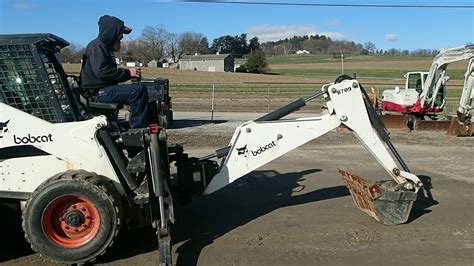 skid steer backhoe for sale on youtube|bobcat with backhoe attachment.